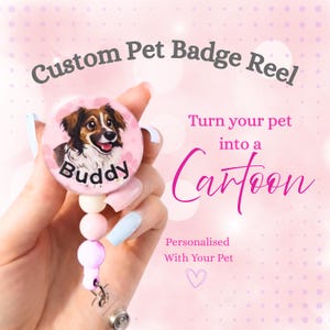 May include: A custom pet badge reel with a cartoon image of a dog named Buddy. The reel is pink with a retractable cord and a decorative bead chain. Text on the image reads "Custom Pet Badge Reel" and "Turn your pet into a Cartoon".
