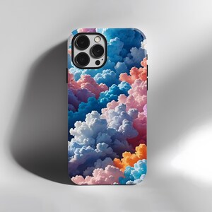 以下が含まれることがあります： 青、ピンク、オレンジ、白の鮮やかな雲模様が特徴のスマートフォンケース。光沢のある仕上がりで、黒いカメラモジュールが付いています。全体的に明るくカラフルなデザインです。