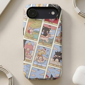 Tarot card phone case with kawaii Sanrio characters like Cinnamoroll and Hello Kitty.