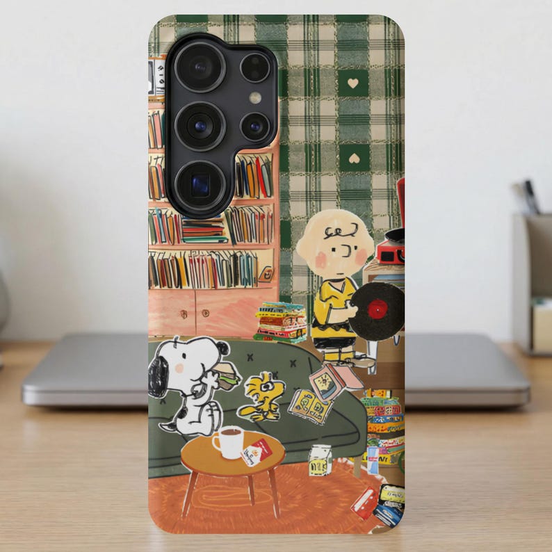 Snoopy and Charlie Brown in a room with bookshelves, records, and a vintage turntable.