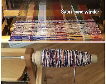 Saori CONE winder adapter slips on the outside pulley.  Saori bobbin winder not included comes with 3 or 6 empty cones   : saorisantacruz