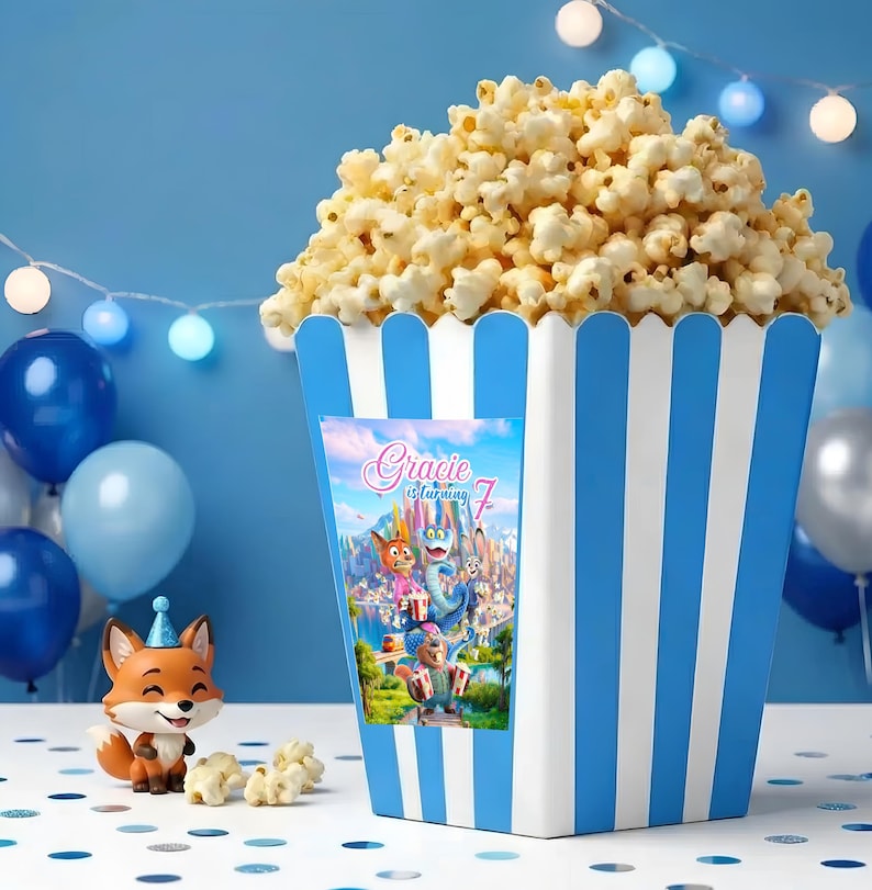 May include: A white ceramic mug with a black handle and the text "But First, Coffee" in a black, handwritten-style font. The mug is on a white surface.