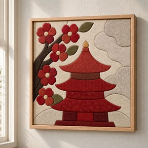 Puede incluir: Una pieza de arte mural cuadrada enmarcada que presenta un aplique de tela texturizada de una pagoda roja de varios niveles. A la izquierda, una rama marrón oscura muestra flores rojas con centros crema y hojas verdes. El fondo consiste en formas de tela beige y gris.