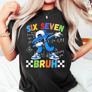May include: Black t-shirt with a colorful graphic featuring the text "SIX SEVEN BRUH" and a blue Pi symbol character dabbing. The character wears a white cap, sunglasses, and blue sneakers. Mathematical equations are in the background.