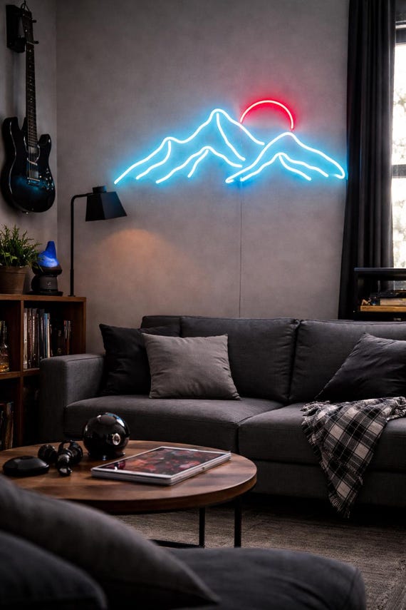 A handmade sunset-gradient mountain landscape rendered in LED neon art — actually visually striking and less clichéd than text neon signs.