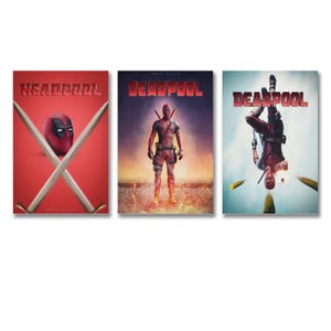May include: Three Deadpool film posters. The first shows the Deadpool mask with crossed swords on a red background. The second features Deadpool standing with a fiery backdrop. The third shows Deadpool upside down.