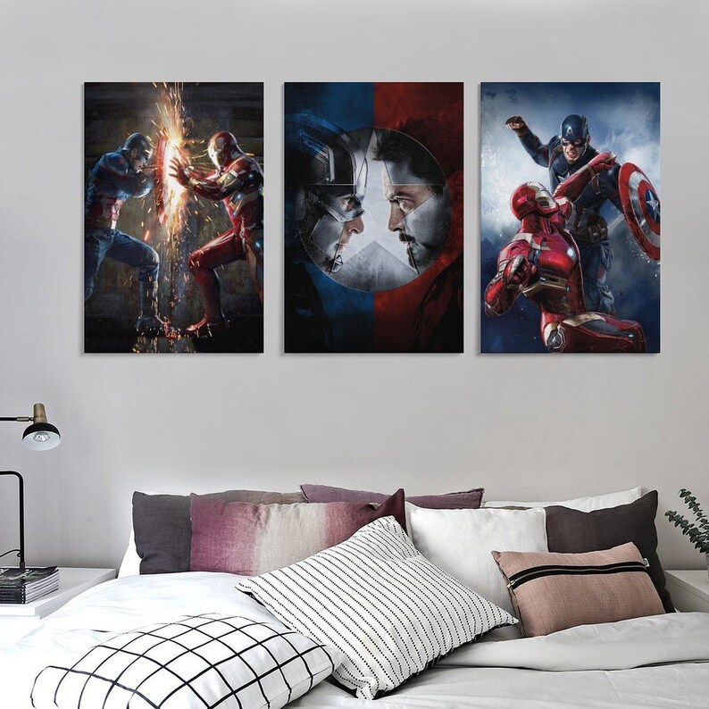 May include: A triptych of framed wall art prints showcasing Captain America and Iron Man in action. The images display dynamic scenes with vivid colours and detailed illustrations. Ideal for a superhero-themed room, each print is approximately 30 x 40 cm.