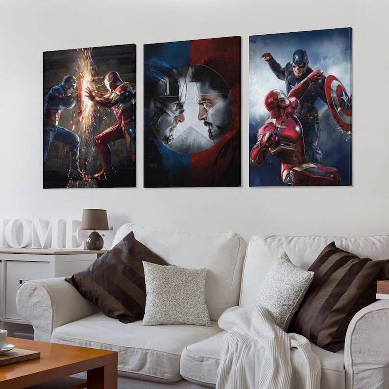 May include: A triptych of canvas prints showcasing Captain America and Iron Man in action. The artwork uses vivid colours and detailed imagery to depict the characters in dynamic poses. Ideal for a superhero-themed room, the prints are a great addition.