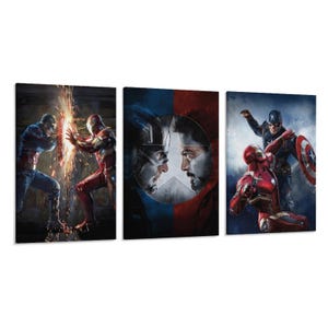May include: A three-panel canvas art set depicting Captain America and Iron Man in action. The artwork shows the characters in their signature costumes, with vivid colours and dynamic compositions. The set includes scenes of conflict and confrontation.