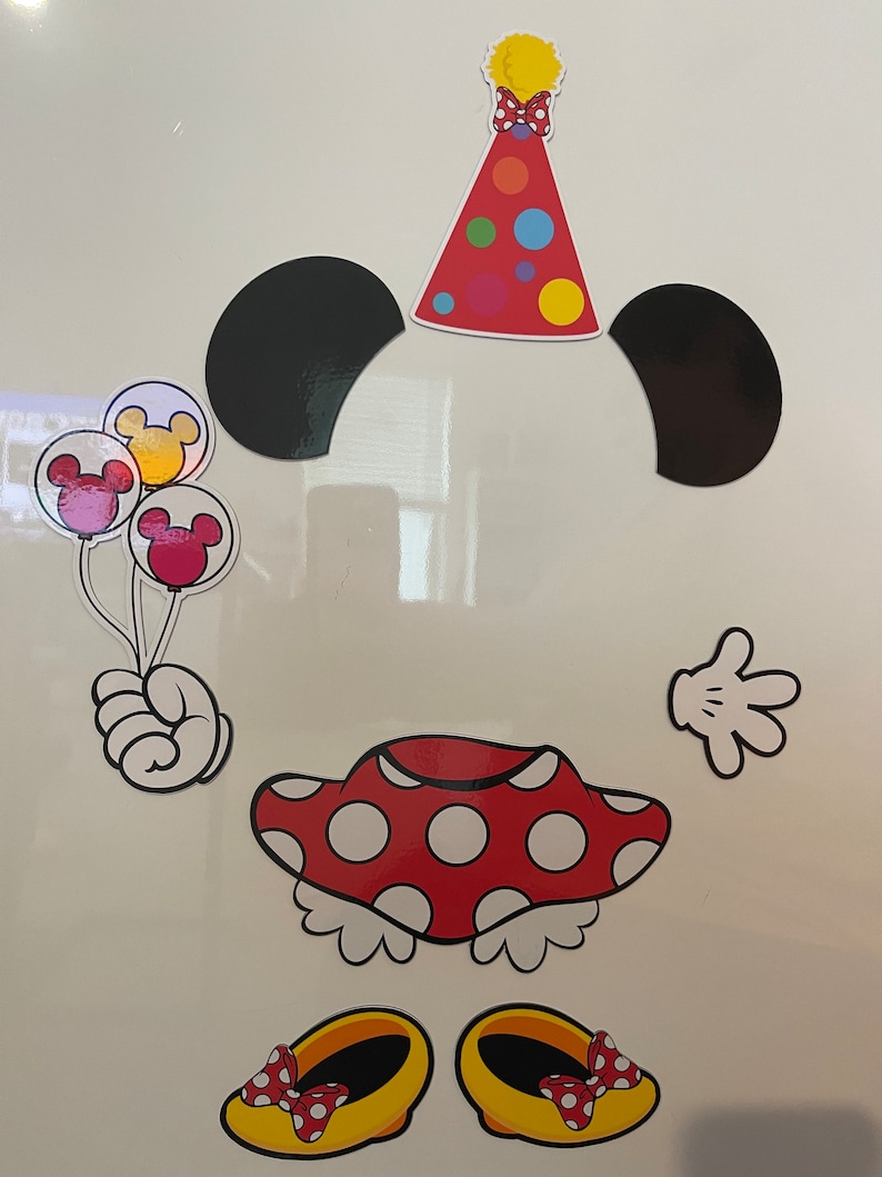 Above is the piece of Minnie birthday magnets. It’s her ears,birthday hat, skirt, shoes, hand, hand with balloons, and theextra personalized magnet