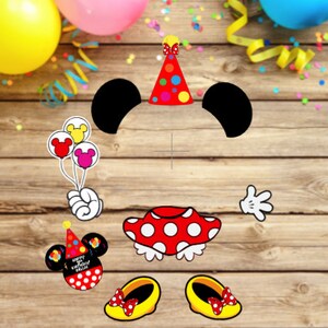 May include: A set of cartoon character cutouts featuring black ears, a red polka-dot skirt, yellow shoes with red bows, white gloved hands, a red party hat with colorful dots, and a cluster of three balloons in yellow, red, and pink colors.