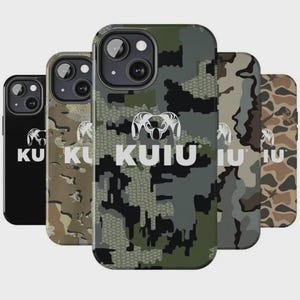 May include: A collection of five smartphone cases arranged in a row, each featuring the KUIU brand logo and a ram head icon. The cases display various patterns, including solid black, multiple shades of green, grey, and brown camouflage designs.