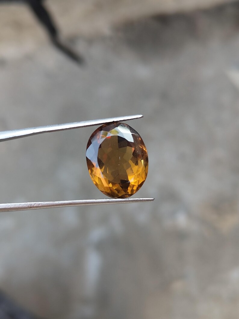 brown quartz gemstone
oval cut quartz
faceted brown quartz
natural quartz stone
loose gemstone
jewelry making stone
luxury quartz gem
oval brown gemstone
quartz ring stone
pendant gemstone
gemstone gift for her