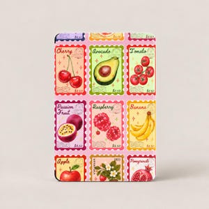 May include: A rectangular print featuring a grid of nine postage stamp illustrations depicting various fruits including cherry, avocado, tomato, passion fruit, raspberry, banana, apple, strawberry, and pomegranate, each labeled with its name.