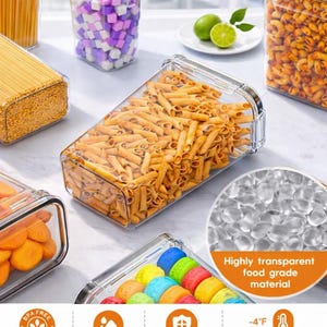 May include: Clear, rectangular food storage containers filled with various dry goods, including pasta, spaghetti, and colorful candies. The containers are made of transparent material, and the image includes text that says "Highly transparent food grade material."