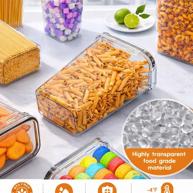 May include: Clear, rectangular food storage containers filled with various dry goods, including pasta, spaghetti, and colorful candies. The containers are made of transparent material, and the image includes text that says "Highly transparent food grade material."