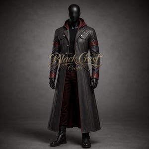 May include: A long, dark gray leather trench coat featuring a quilted shoulder pattern, a maroon hood, and matching maroon cuffs. The coat has a button-front closure and is worn over dark trousers. The text Black Crest Crafts is visible.