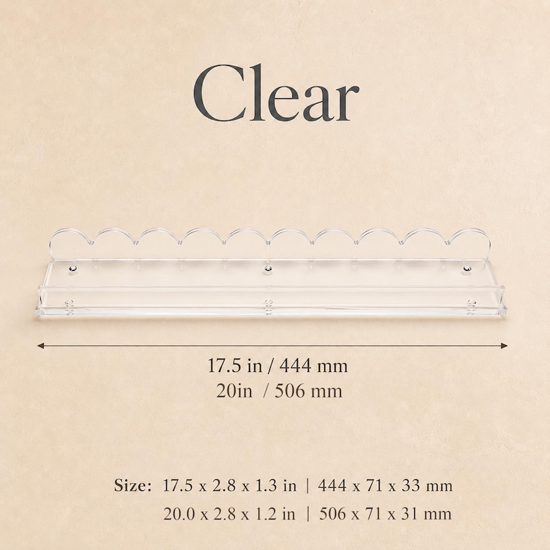 May include: A clear, scalloped-edge shelf. The shelf is 17.5 inches (444 mm) long and 2.8 inches (71 mm) wide. The text "Clear" is above the shelf. The shelf is 1.3 inches (33 mm) tall.