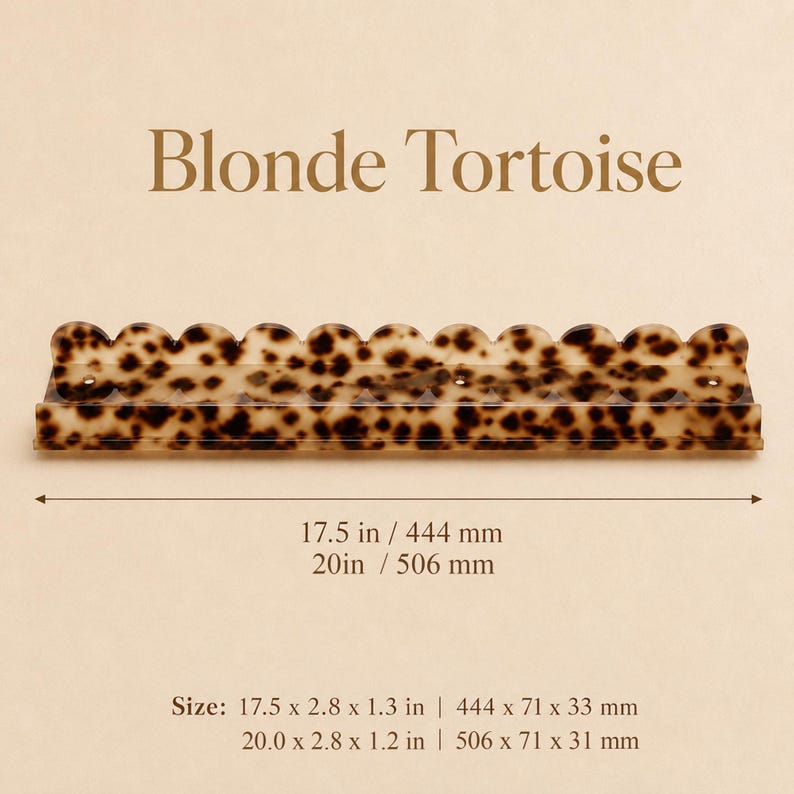 May include: A decorative Blonde Tortoise hair clip with a scalloped edge. The clip is 17.5 inches long and 2.8 inches wide. The text "Blonde Tortoise" is at the top of the image.