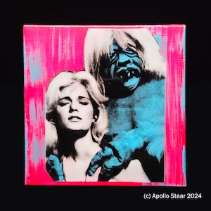 May include: A collage artwork featuring a woman with long blonde hair and a blue creature with a large head and a menacing expression. The artwork is set against a bright pink background.