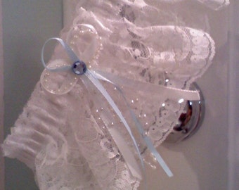 Wedding garter.. white lace with white and blue satin ribbon