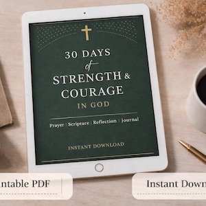 May include: A digital tablet displays the text "30 Days of Strength & Courage in God" with a cross icon. A white coffee mug with dark coffee and a gold pen are on the wooden surface. The words "Printable PDF" and "Instant Download" are also visible.