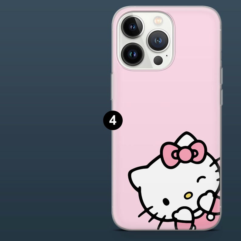 May include: Pink phone case featuring a Hello Kitty design. The case has a clear border and a smooth surface. The Hello Kitty graphic is white with a pink bow and accents. The phone case is designed to fit a smartphone.