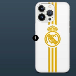 May include: White phone case with gold vertical stripes and a gold emblem. The emblem features a crown above a circular design with the letters "RMCF". The case is designed for a smartphone.