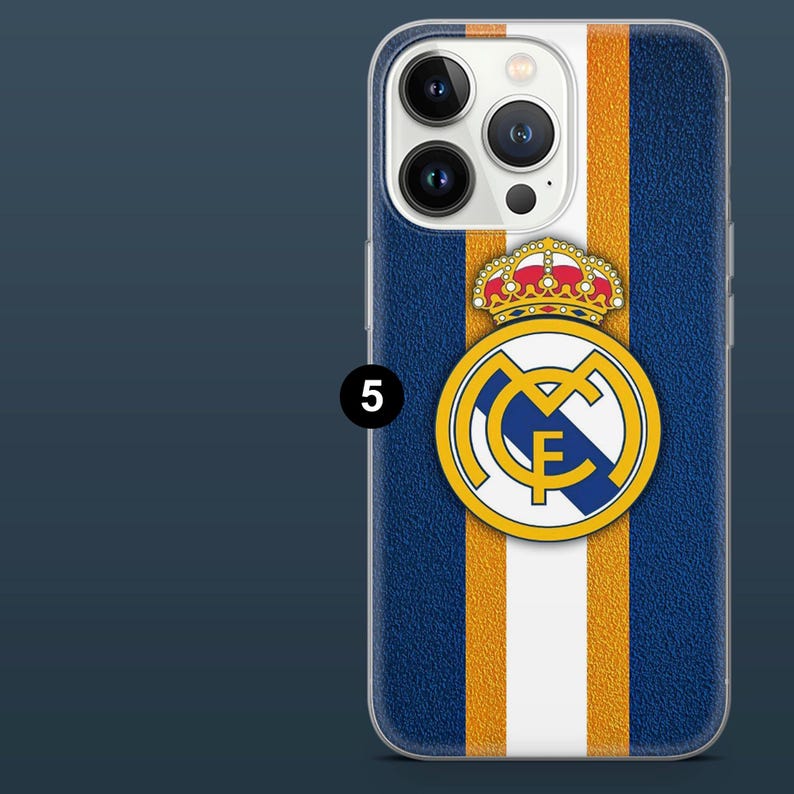 May include: A blue phone case with a white and orange vertical stripe design. The case features a gold and white emblem with a crown and the number 5. The case is designed for a smartphone.