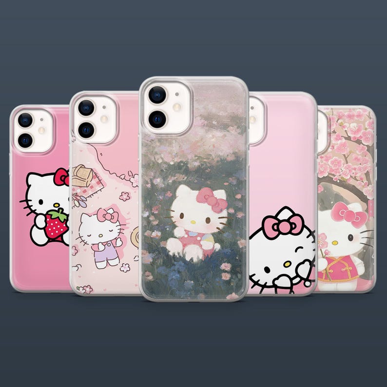 May include: A collection of five phone cases featuring Hello Kitty designs. Each case has a different pink background and a unique illustration of Hello Kitty, including one holding a strawberry and another surrounded by cherry blossoms.