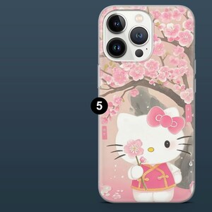 May include: A phone case featuring a cartoon character with a pink bow and a pink outfit, holding a pink flower. The background includes pink cherry blossoms and a tree branch. The case has a pink hue.