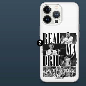 May include: White phone case featuring a black and white design with the words "REAL MADRID" and images of soccer players. The case also includes the text "EL REY DE EUROPA".