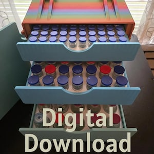 May include: A multi-tiered storage organiser with a rainbow-coloured top and light blue drawers, filled with small glass vials featuring blue and red caps. The text Digital Download is overlaid on the bottom drawer of this 3D printed storage unit.