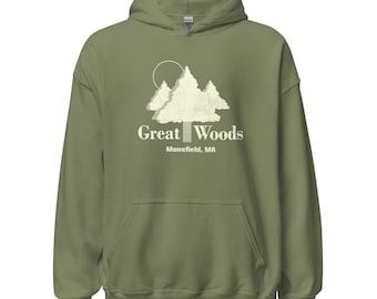 May include: Olive green hooded sweatshirt with a white graphic of stylized trees and a sun. The text "Great Woods" is below the graphic, with "Mansfield, MA" underneath. The sweatshirt has a front pocket and a drawstring hood.