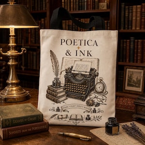 May include: A beige tote bag with black handles featuring a vintage illustration. The illustration includes a typewriter, quill, inkwell, books, and the text "POETICA & INK". The bag is on a wooden surface with books and a pen.