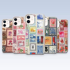 May include: Five phone cases displaying a collage of vintage postage stamps. The stamps feature diverse designs, including flowers, landmarks, and animals. The cases are arranged in a row, showcasing a variety of colours and patterns.