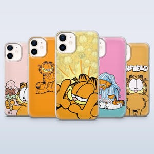 May include: A collection of five phone cases featuring the cartoon character Garfield. Each case has a different design, including Garfield with ice cream, standing, and in pajamas. The cases are in various colors, including pink, orange, and yellow.
