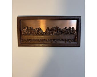Tableau encadré en haut-relief de la Guilde des artisans du cuivre, représentant la Cène.
