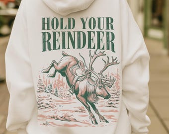 Hold Your Reindeer Hoodie | Funny Rancher Christmas Pullover - Retro Holiday Rodeo Top - Vintage Cowgirl Xmas - Country Winter