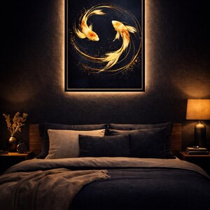 May include: A framed artwork featuring two golden koi fish swimming in a circle against a dark blue background. The artwork is illuminated by a warm, golden light, creating a serene ambiance. The artwork is above a bed with dark blue bedding.