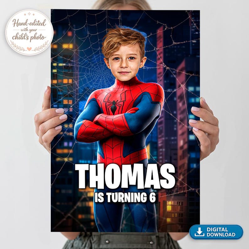 May include: A personalised poster featuring a child's face edited onto a red and blue superhero costume with a spider emblem. The background shows a city skyline at night with a spiderweb overlay. Text reads: THOMAS IS TURNING 6.