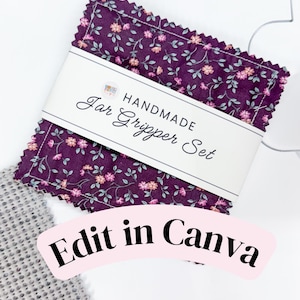 May include: A square fabric jar gripper set with a dark purple background featuring a small floral pattern in pink and green. The edges are pinked and the set is wrapped in a white paper band with the text HANDMADE Jar Gripper Set.