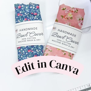 May include: Two fabric bowl covers, one blue with a pink and white floral pattern and one pink with a white and green floral pattern. Each has a white paper label reading HANDMADE Bowl Cover 100% COTTON MACHINE WASH & DRY. A ruler is visible.