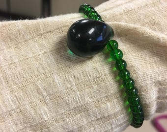 Green glass bracelet