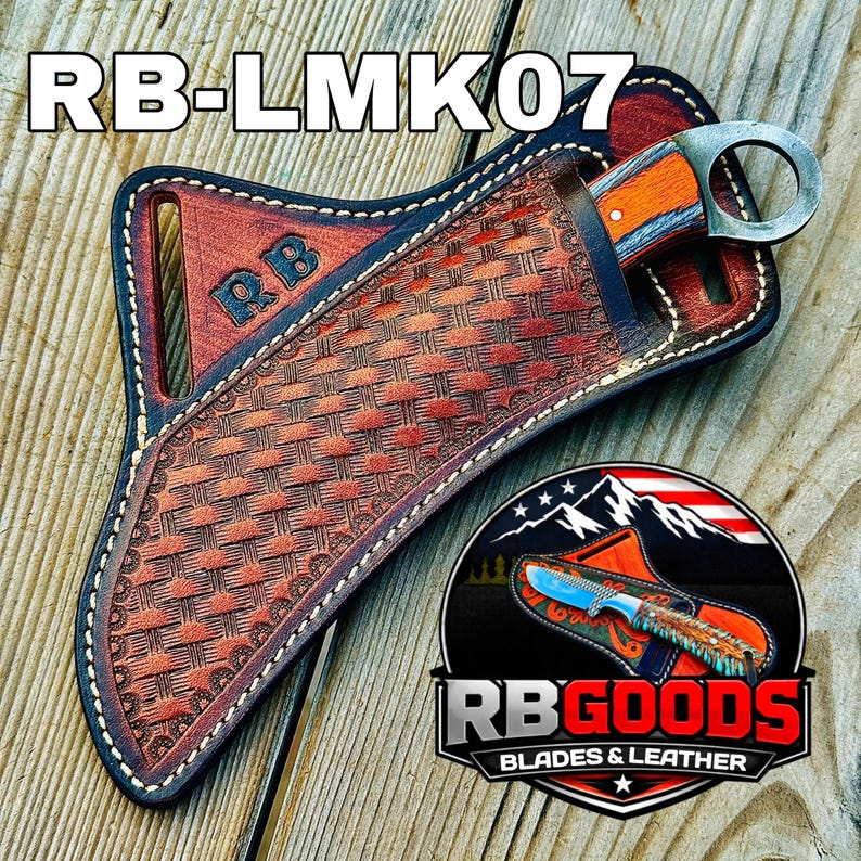May include: A leather knife sheath with a woven pattern, holding a karambit knife. The knife has an orange and silver handle. The sheath is brown with black trim and the text "RB-LMK07". The logo "RB GOODS BLADES & LEATHER" is also visible.