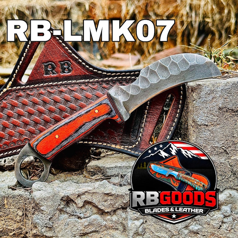 May include: A custom knife with an orange and gray wooden handle and a curved, textured blade. The knife rests on a stone surface with a leather sheath featuring the text "RB-LMK07" and the logo "RB GOODS BLADES & LEATHER".