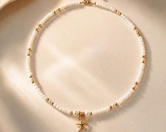 Naszyjnik Coastal Luxe Starfish | Ręcznie robiony naszyjnik plażowy z pereł i złota | Minimalistyczna biżuteria w stylu nadmorskim | Biały naszyjnik z koralików | Letni naszyjnik
