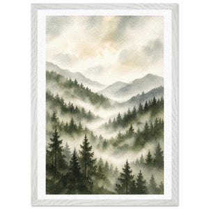 May include: Watercolor painting of a misty mountain landscape. The artwork features layers of green trees and rolling hills, with fog filling the valleys. The sky is a soft blend of yellow and gray, framed in a white wooden frame.