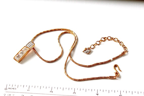 Swarovski gold tone necklace Marked with Swan # 1107
