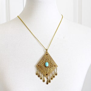 Victorian Filigree  Pendant with Turquoise cabochon and  Garnet  Rhinestones #579